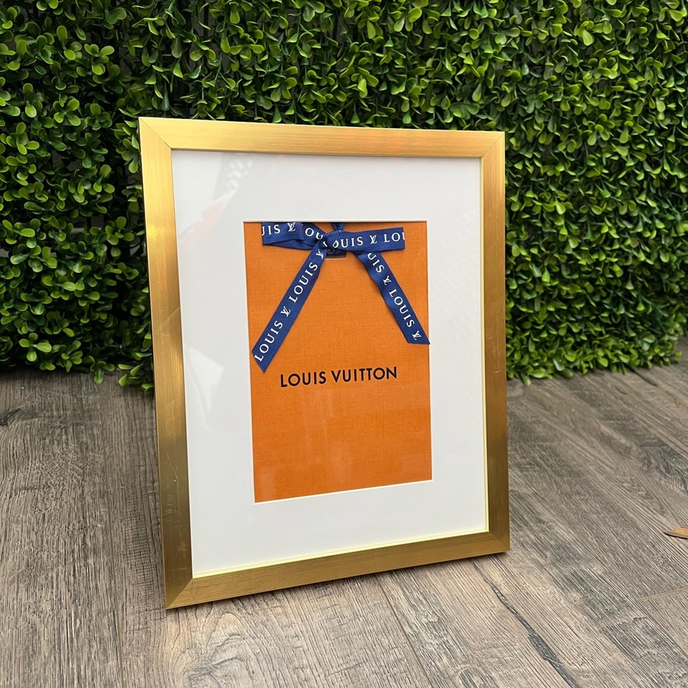 Louis Vuitton small shopping bag in a frame